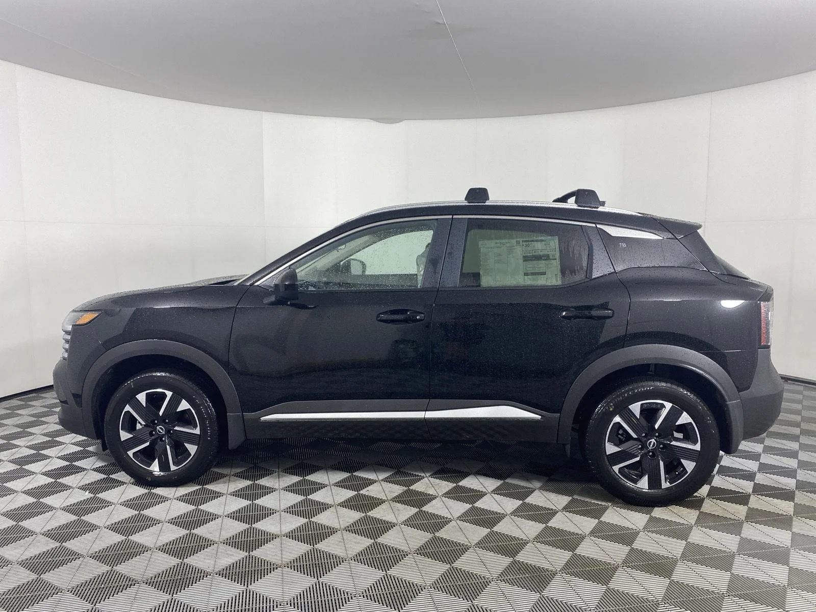 New 2026 Super Black Nissan SV image 14