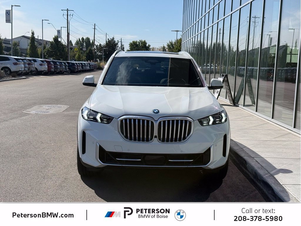New 2026 Alpine White BMW xDrive50e image 8