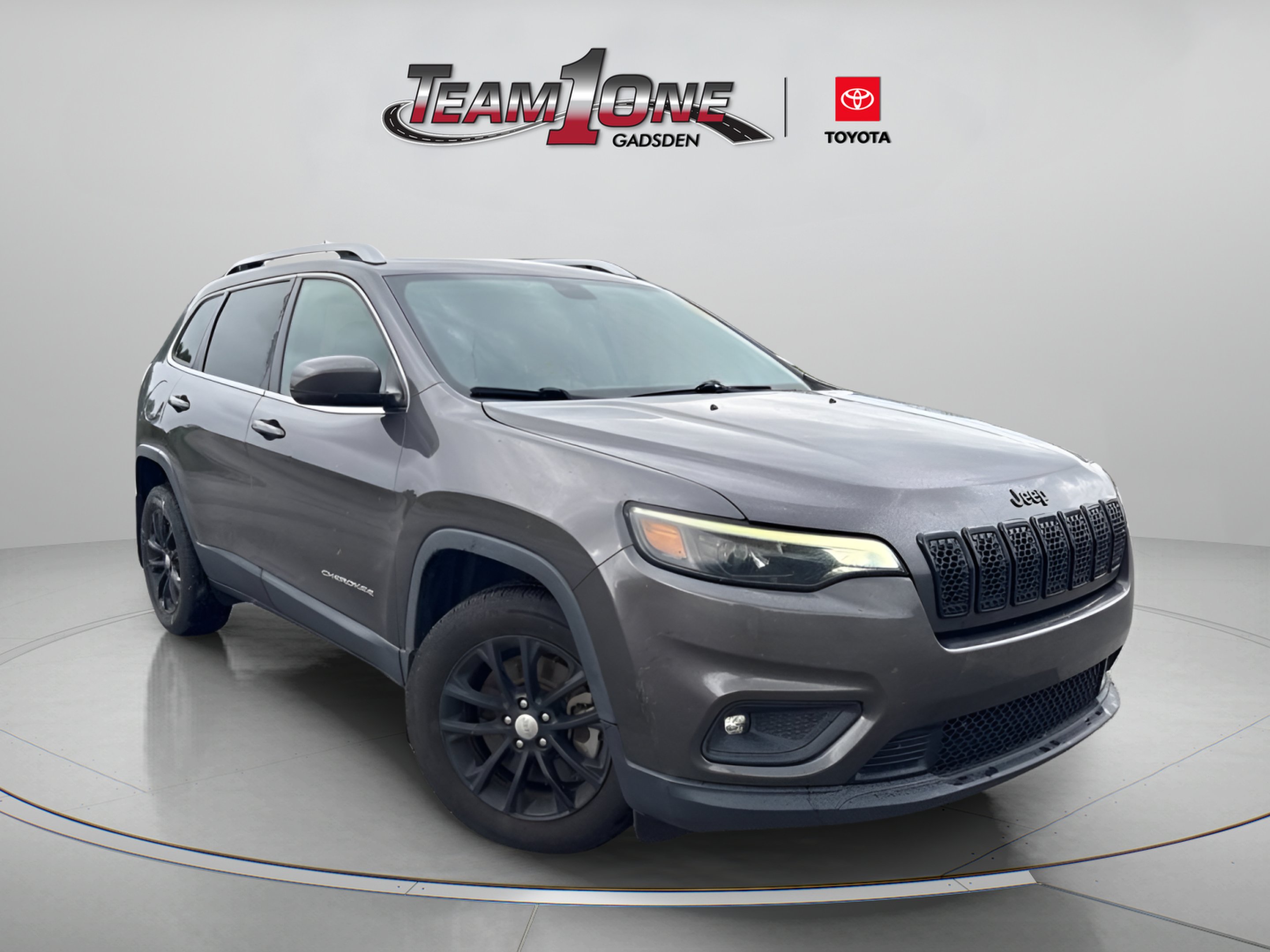 Used 2019 Granite Crystal Metallic Clearcoat Jeep Latitude Plus image 1