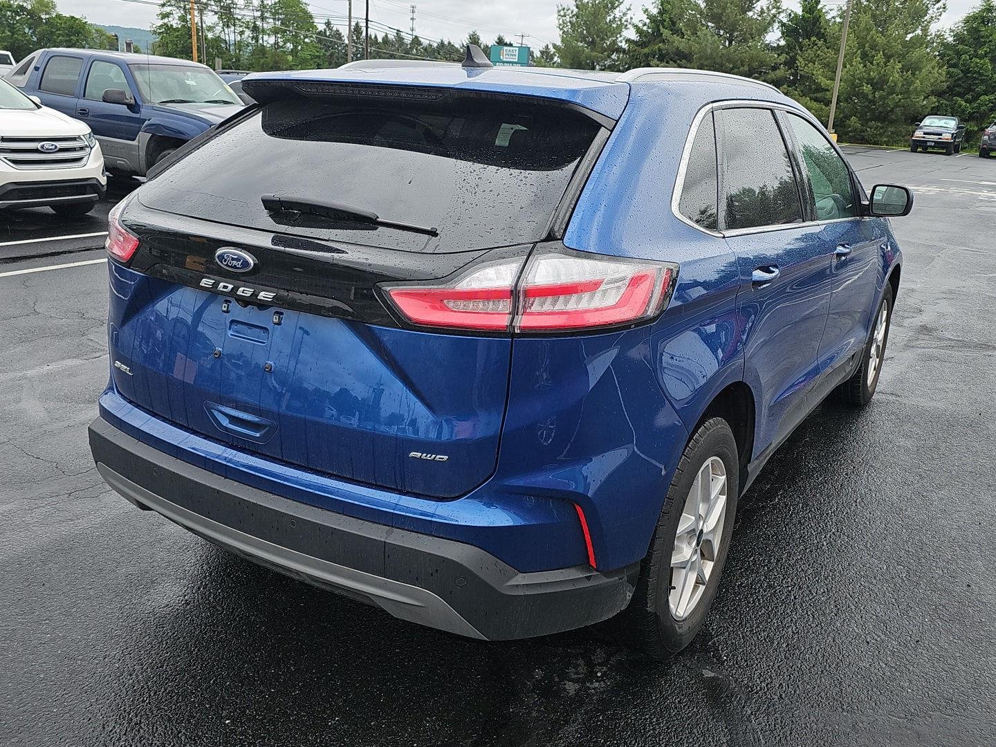 Used 2023 Atlas Blue Metallic Ford SEL image 2