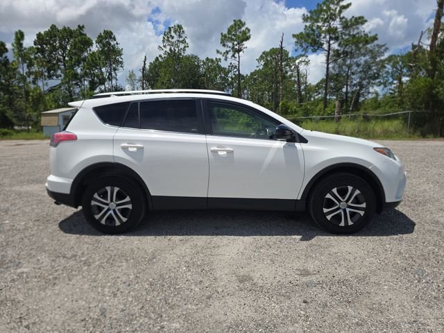 Used 2017 Toyota RAV4 LE with VIN JTMZFREV1HJ701330 for sale in Brooksville, FL