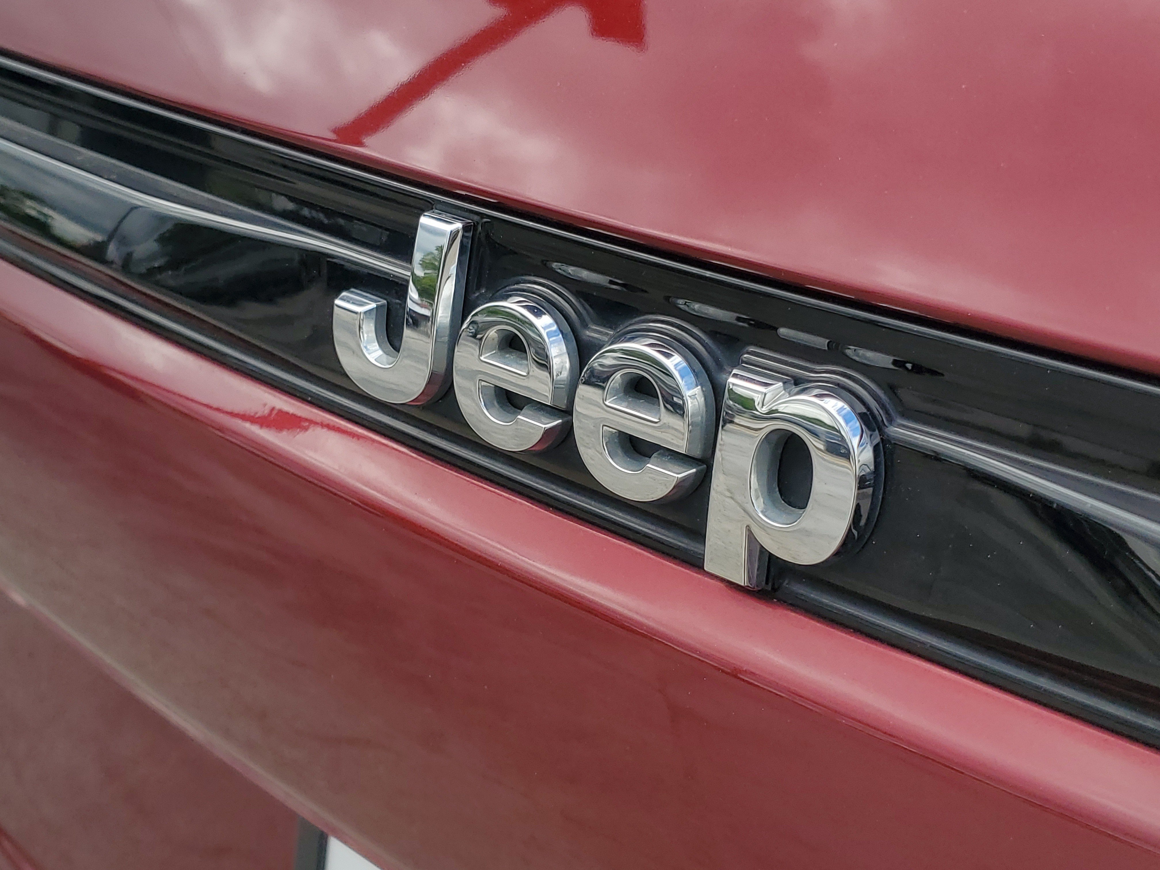 Used 2023 Velvet Red Pearlcoat Jeep Laredo image 7