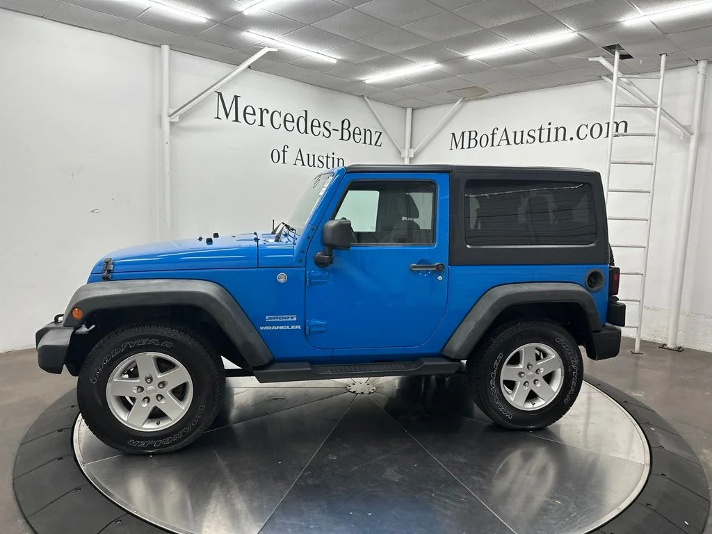 Used 2011 Blue Jeep Sport image 4