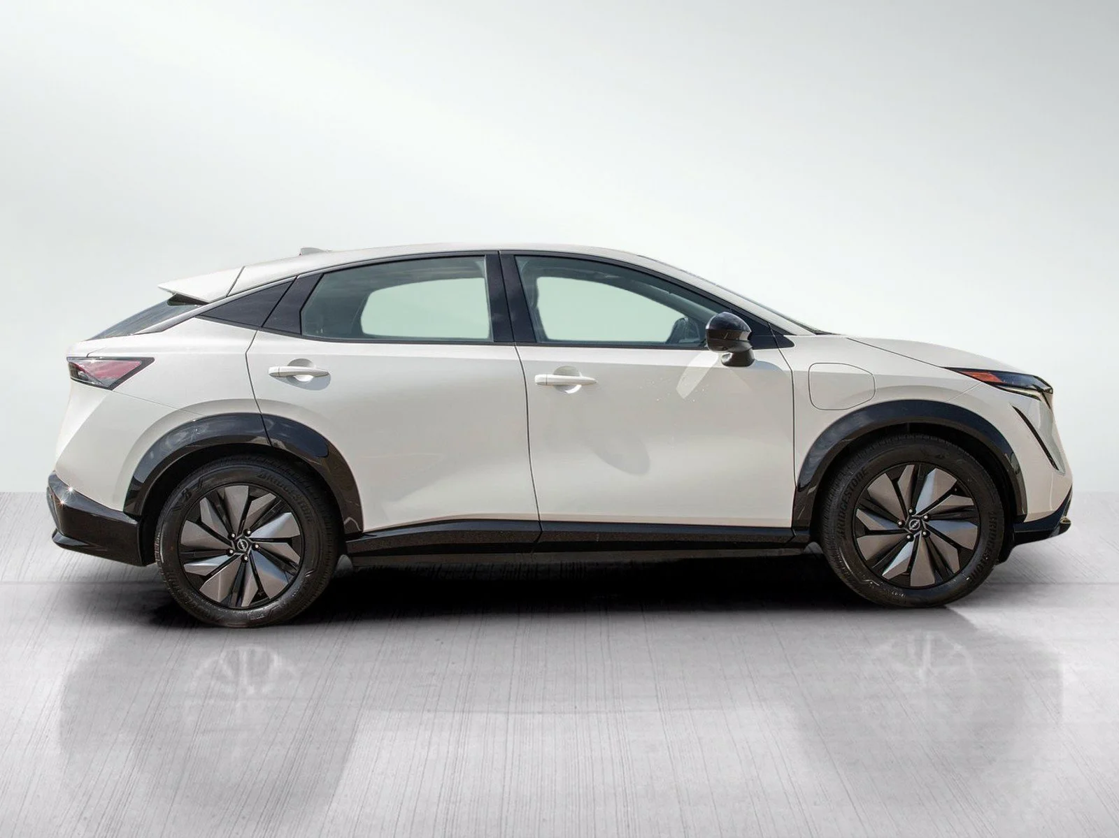 Used 2024 Everest White Pearl Tricoat Nissan EVOLVE+ e-4ORCE image 6