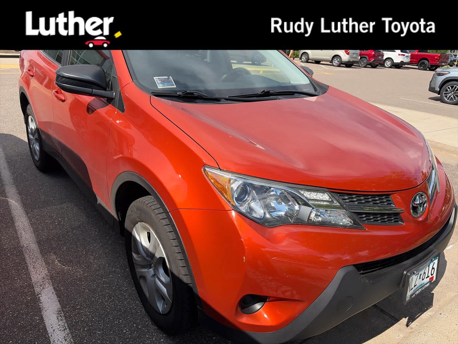 Used 2015 Hot Lava Toyota LE image 1