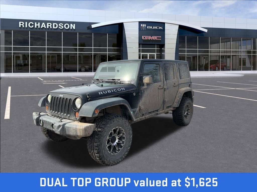 Used 2009 Jeep Wrangler Unlimited Rubicon with VIN 1J8GA69149L703325 for sale in Midland, MI
