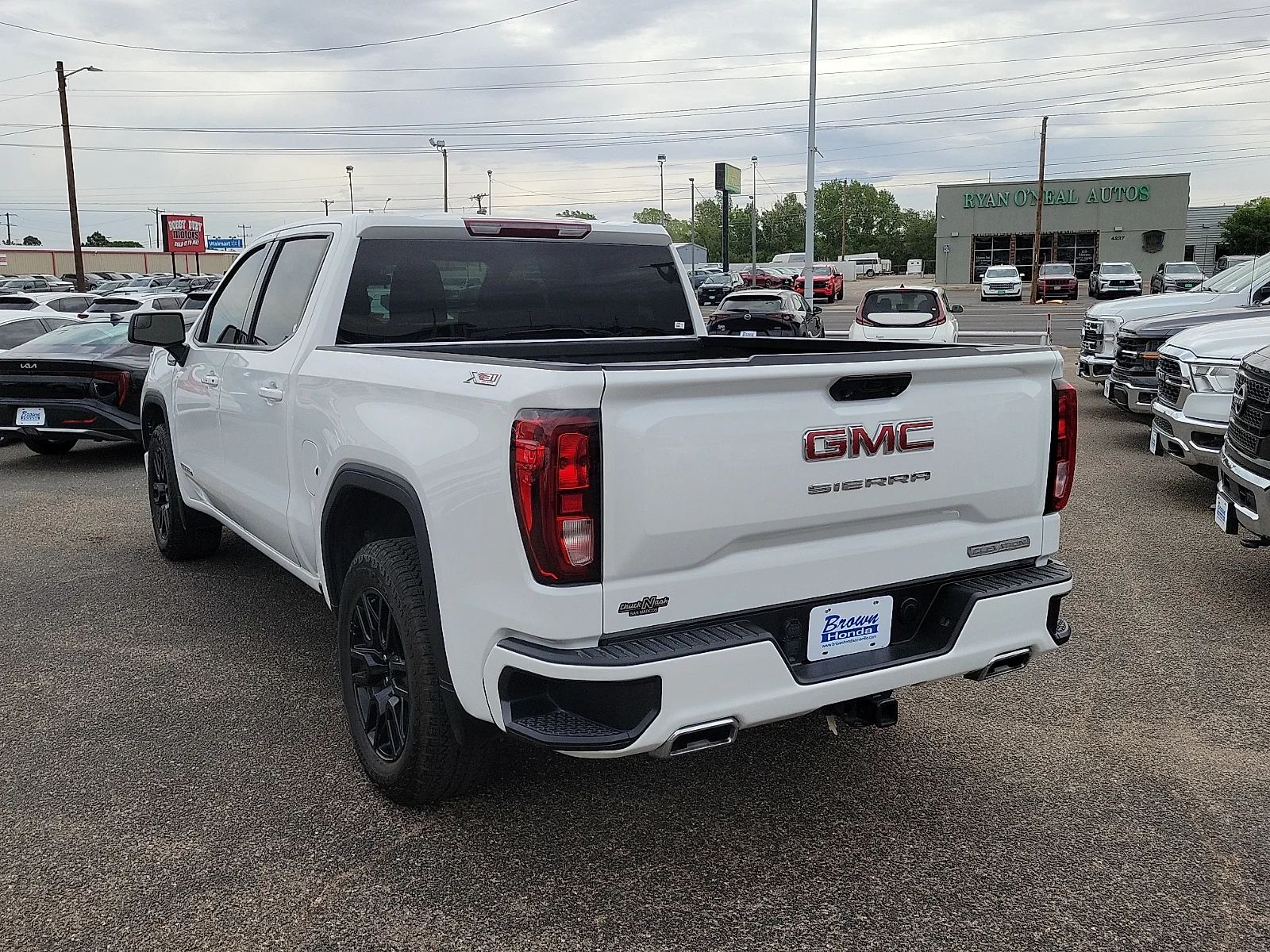 Certified Used 2024 Summit White GMC 4WD Crew Cab Short Box Elevation with 3SB image 8