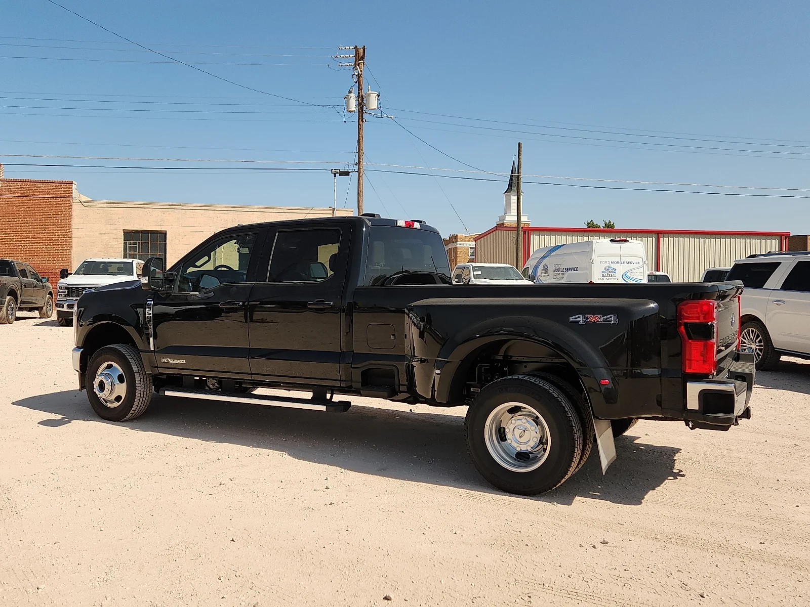 New 2026 Black Metallic Ford Lariat image 4