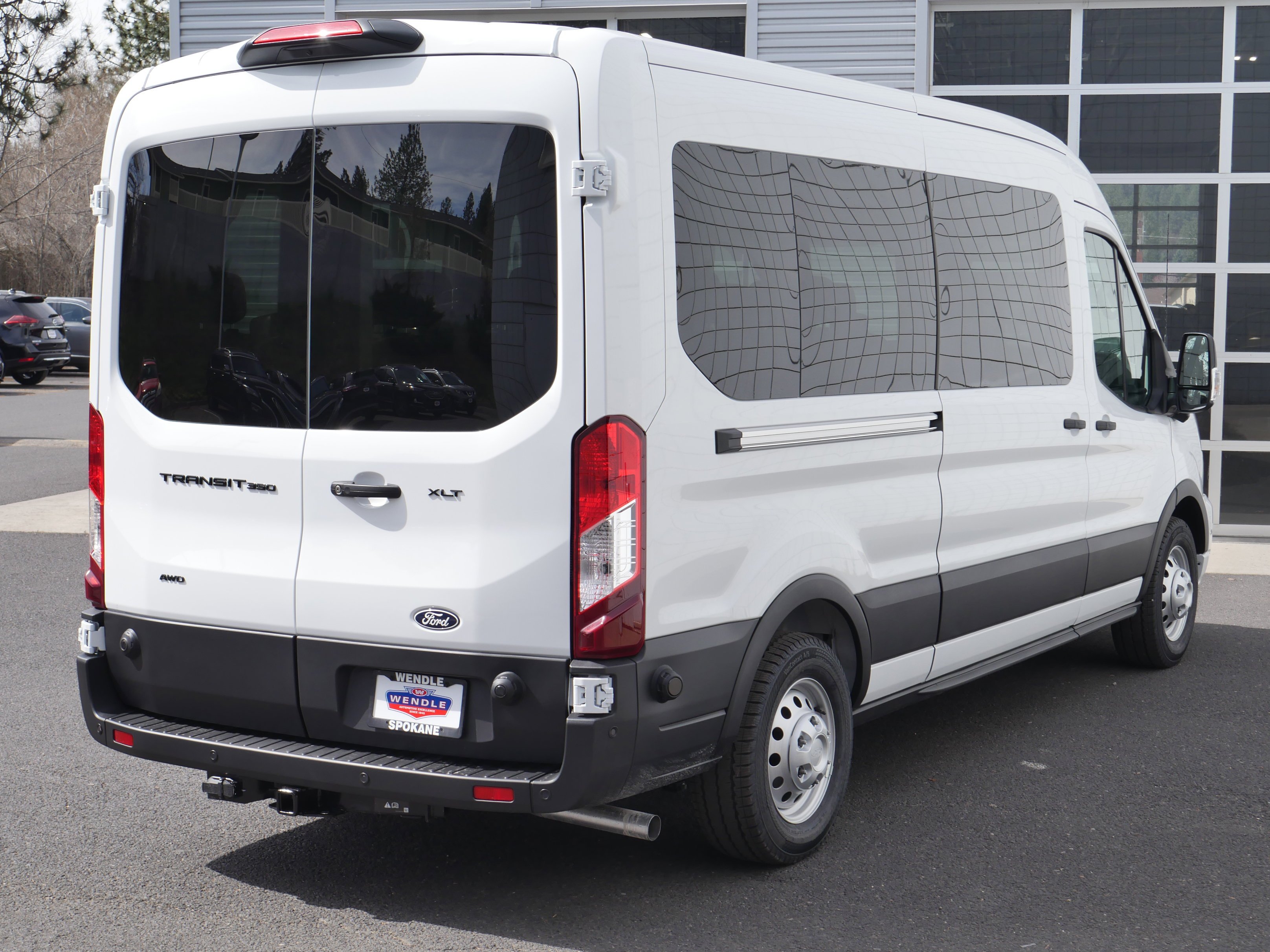New 2026 Oxford White Ford Passenger Van XLT image 24