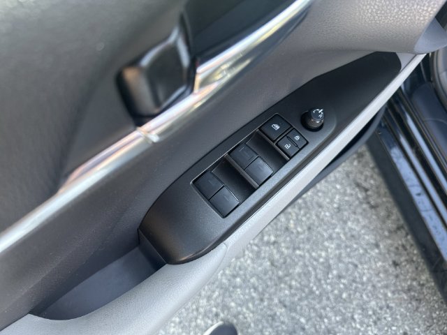 Used 2024 Midnight Black Metallic Toyota LE image 24