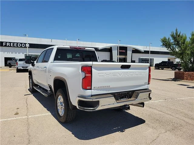 Used 2025 Summit White Chevrolet LTZ 4x4 Crew Cab 8 ft. box 172 in. WB image 2