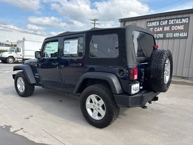 Used 2013 Blue Jeep Unlimited Sport image 5