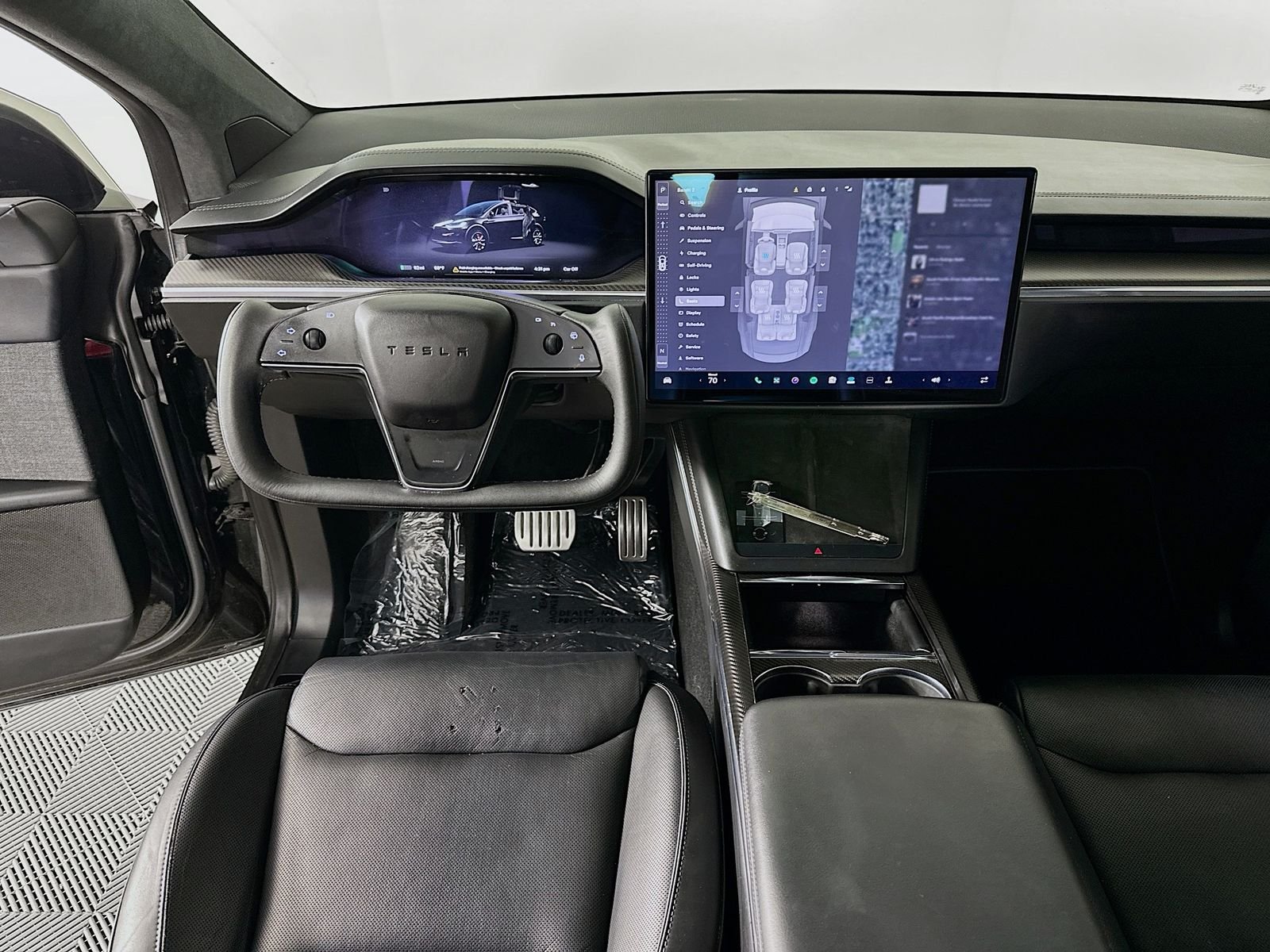 Used 2023 Solid Black Tesla Plaid image 22