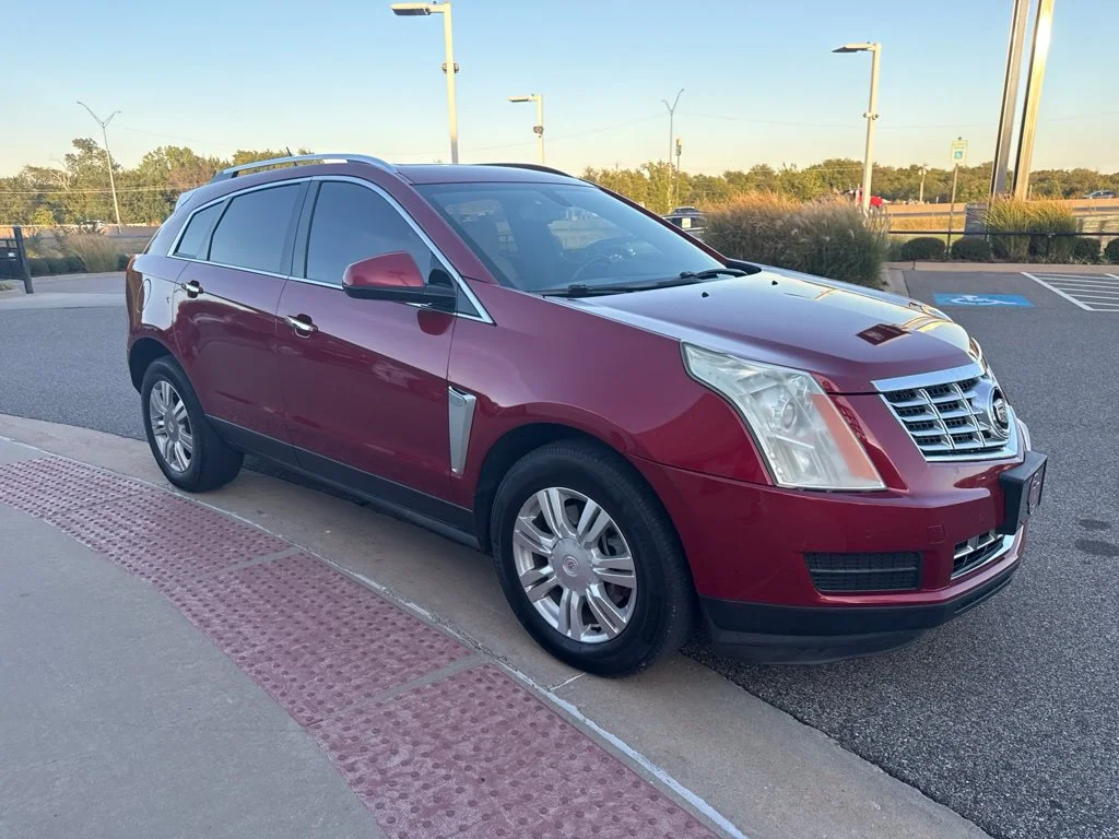 Used 2015 Red Cadillac Luxury image 1