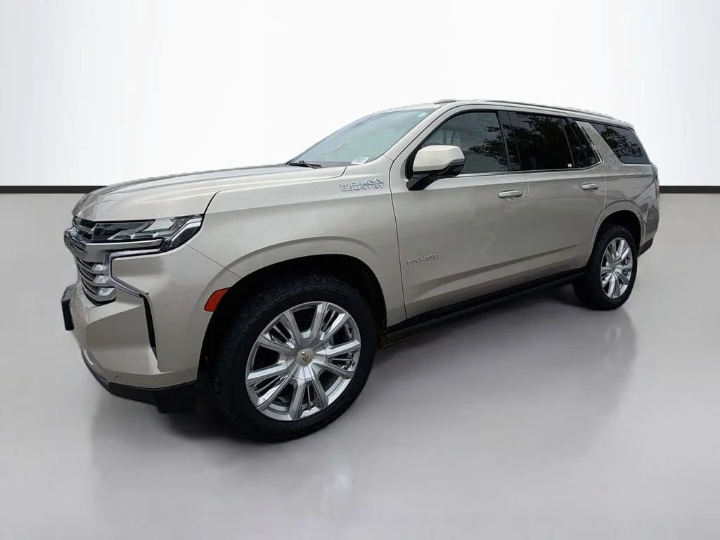 Used 2021 EMPIRE BEIGE METALLIC Chevrolet High Country image 1