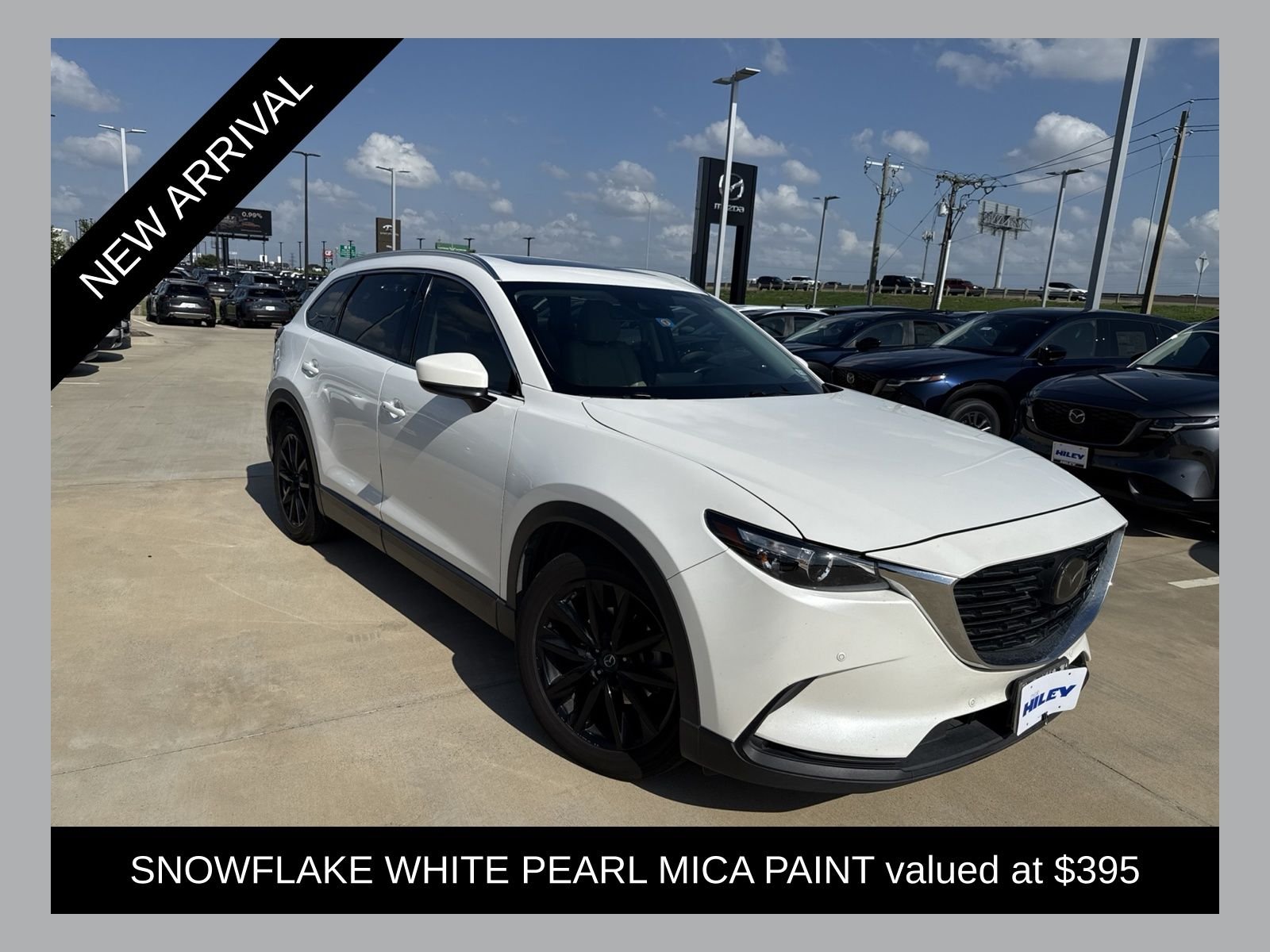 Used 2022 Snowflake White Pearl Mica Mazda Touring Plus image 1
