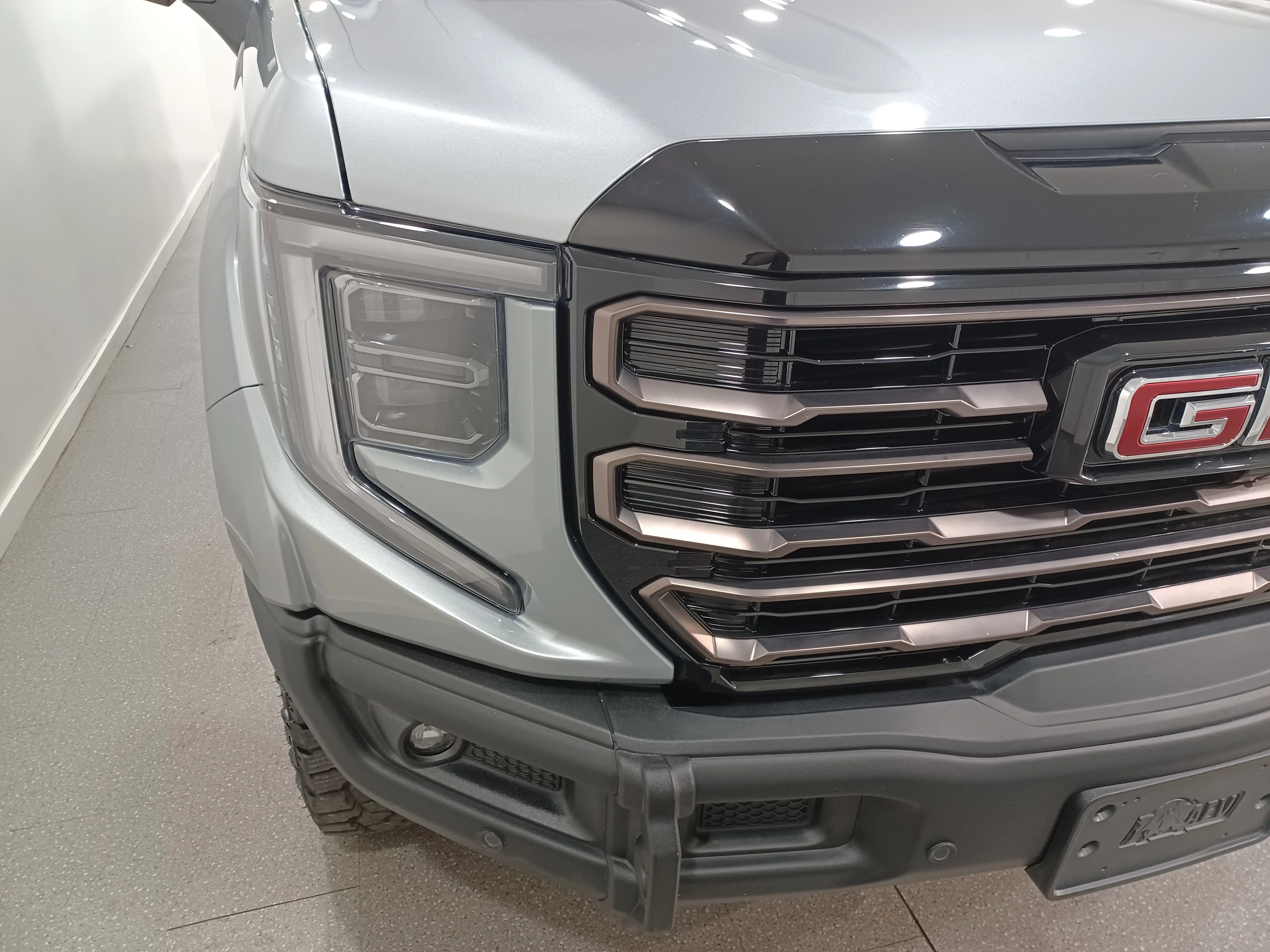 Used 2024 Sterling Metallic GMC AT4X 4WD*3.0L Duramax | Adaptive Cruise | Remote Start | Cooled Leather | Sunroof | Htd Wheel | AEV image 4