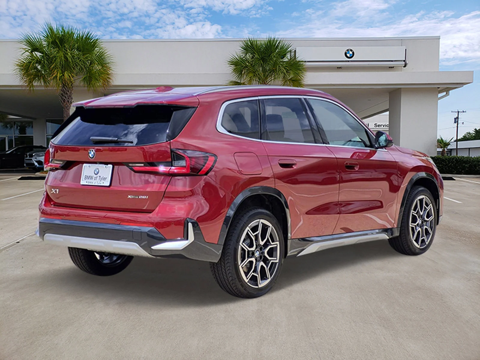 New 2026 Vegas Red Metallic BMW xDrive28i image 4