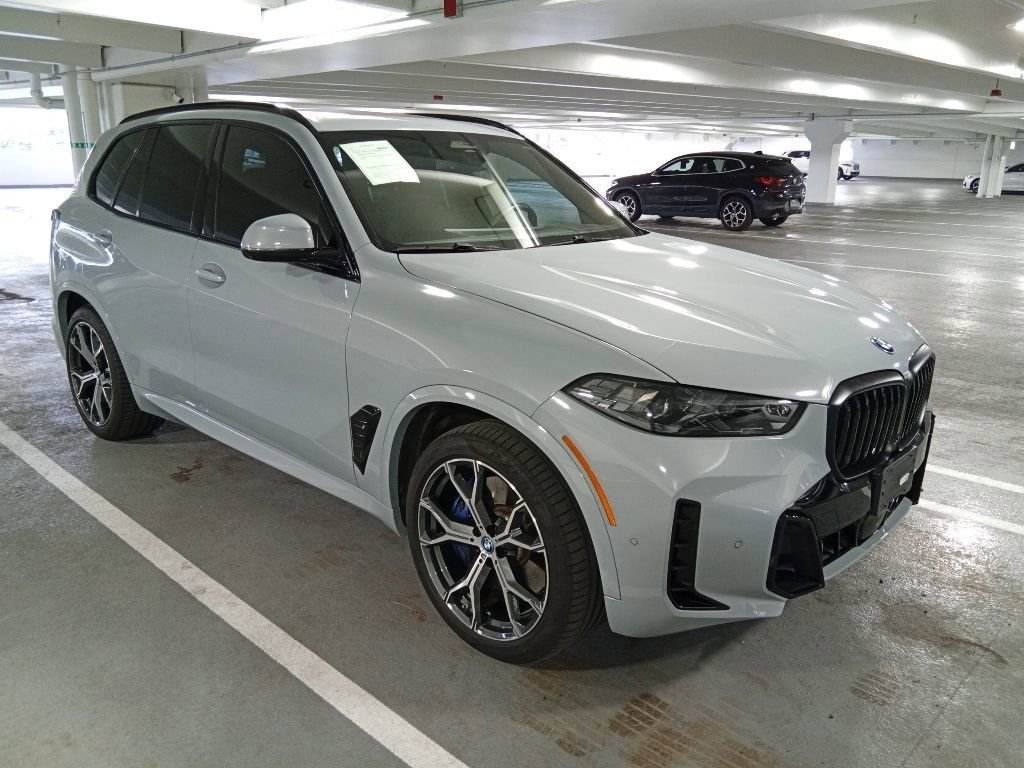 Used 2024 Brooklyn Grey Metallic BMW xDrive50e image 3