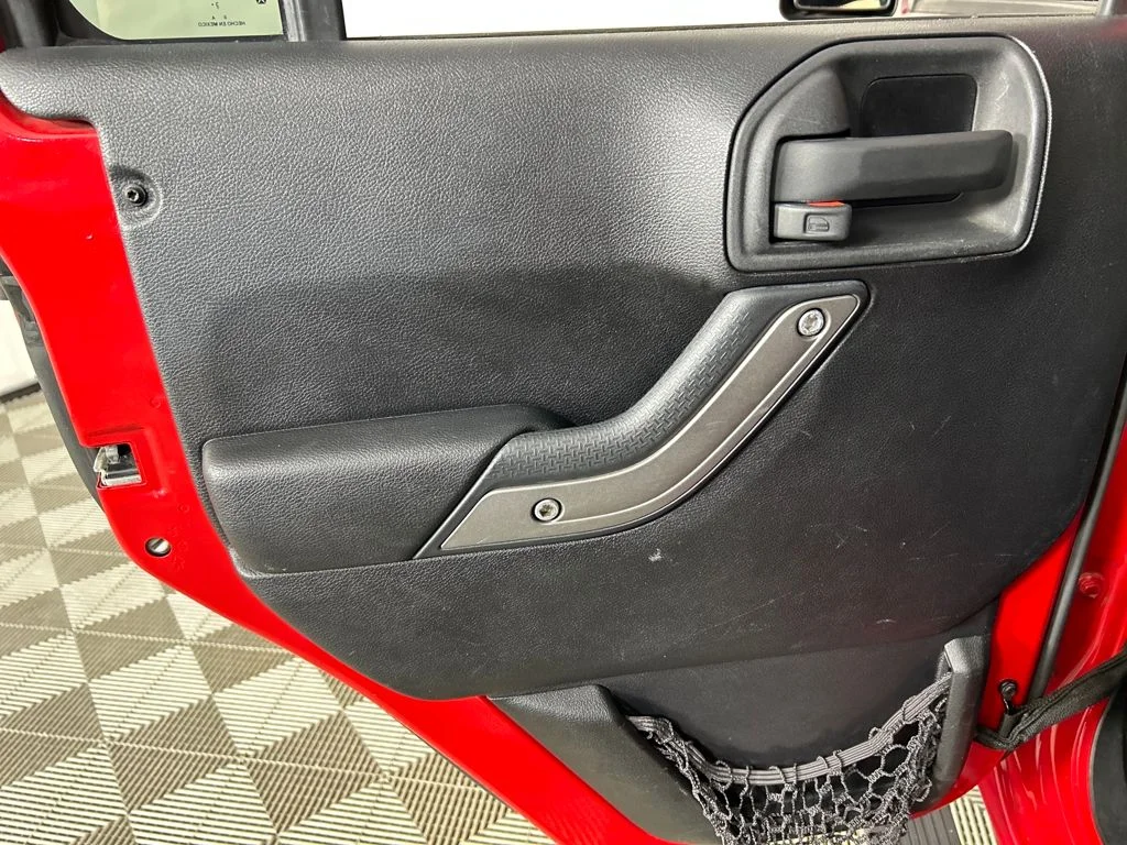 Used 2014 Red Jeep Unlimited Sport image 16