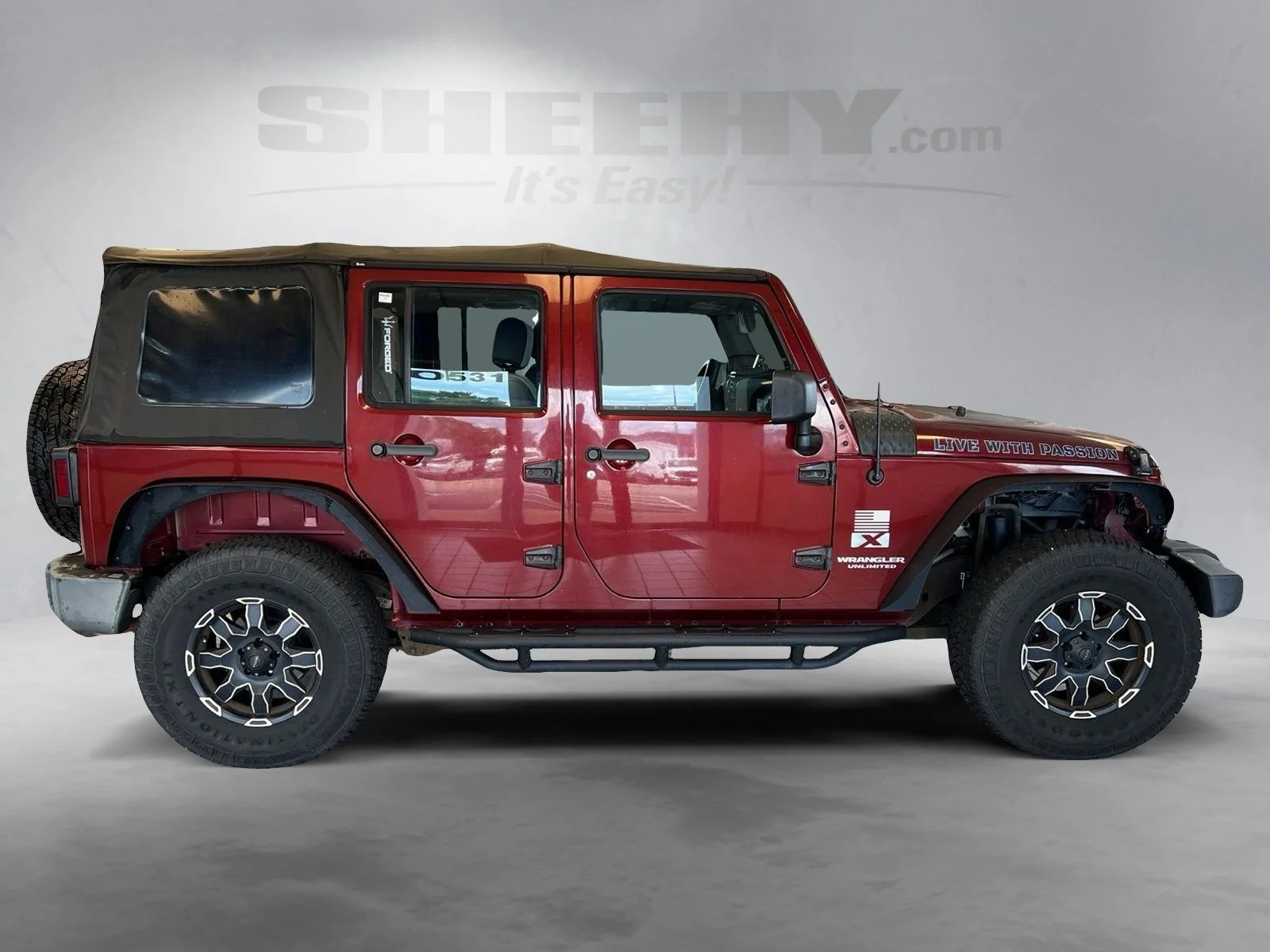 Used 2007 Red Rock Crystal Pearlcoat Jeep Unlimited X image 9