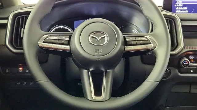 New 2026 Machine Gray Metallic Mazda Premium AWD image 24