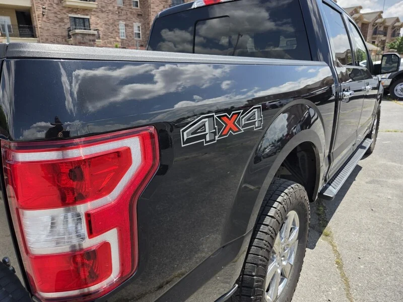 Used 2020 BLACK FORD XLT 4WD SUPERCREW 5.5