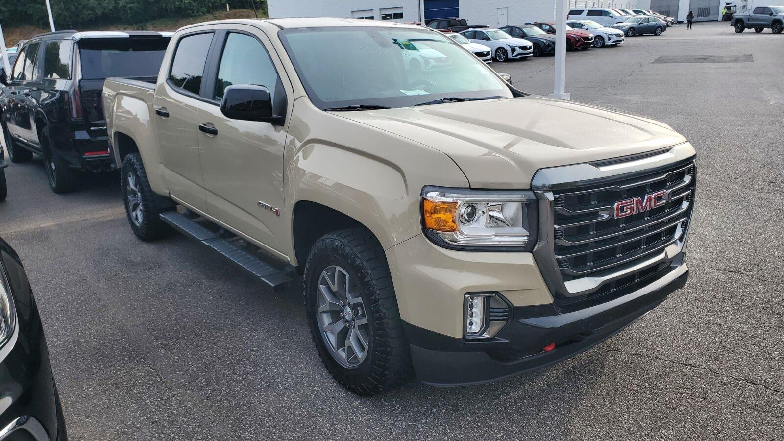 Used 2022 DESERT SAND METALLIC GMC 4WD AT4 w/Cloth image 2