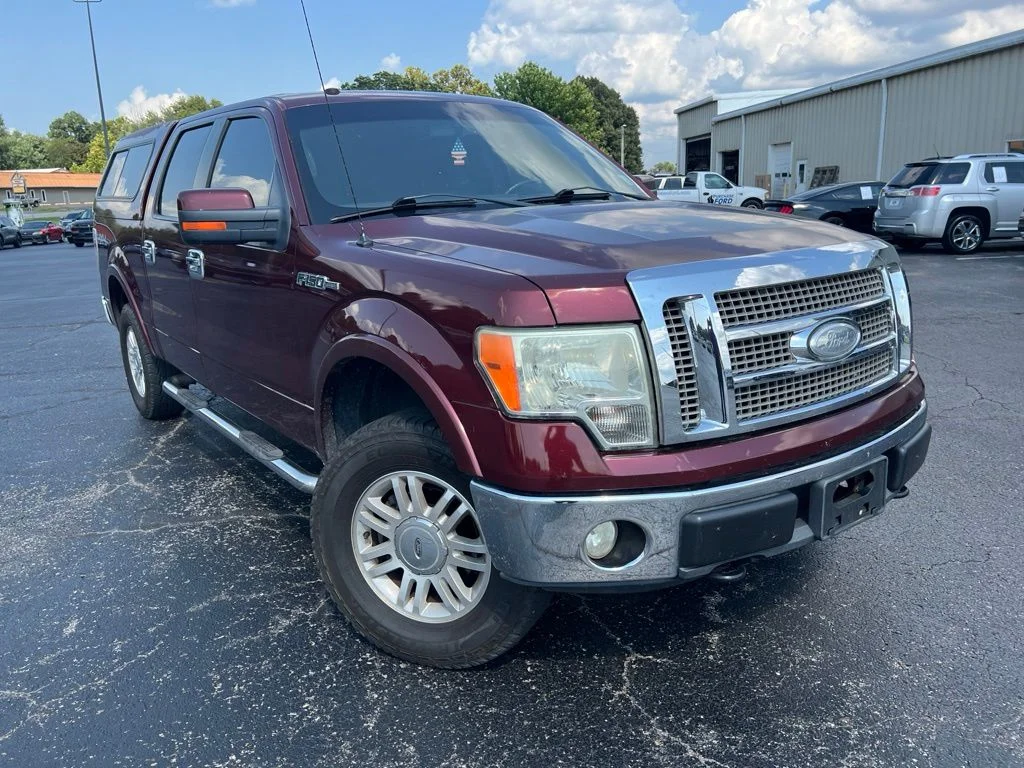 Used 2009 Razor Red Metallic / Tinted Clearcoat Ford Lariat image 1