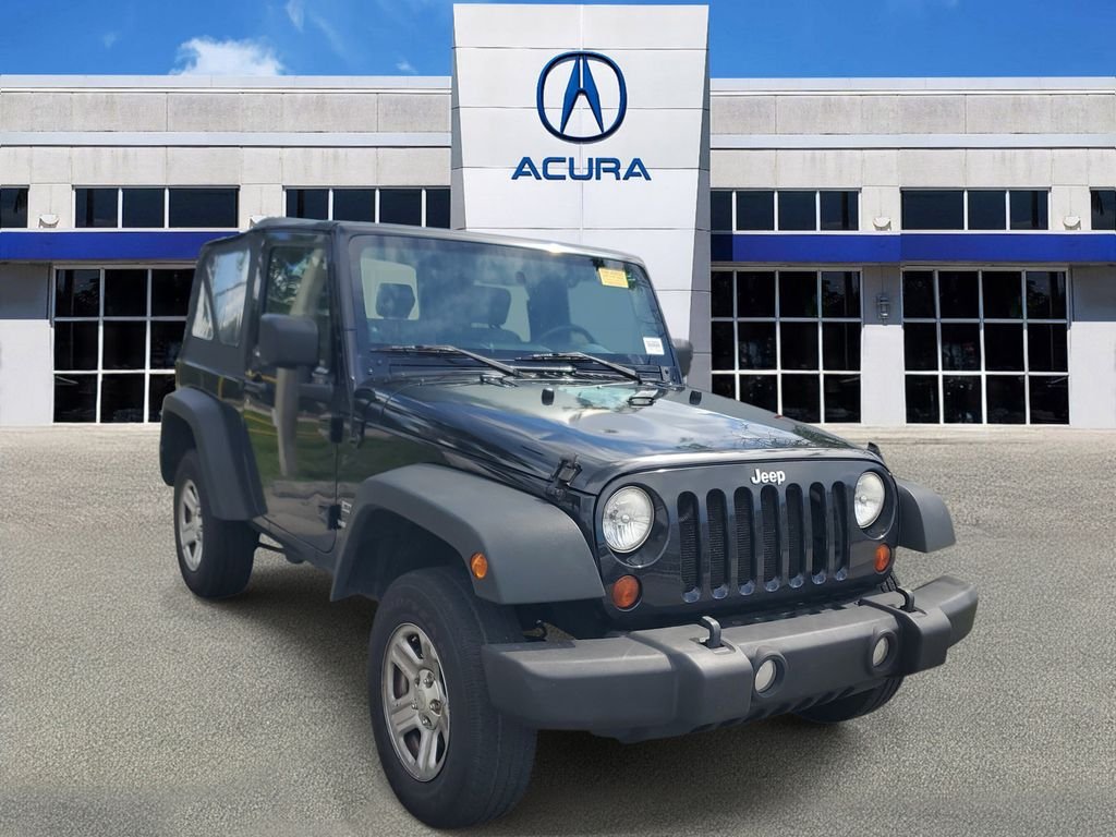 Used 2010 Black Jeep Sport image 1