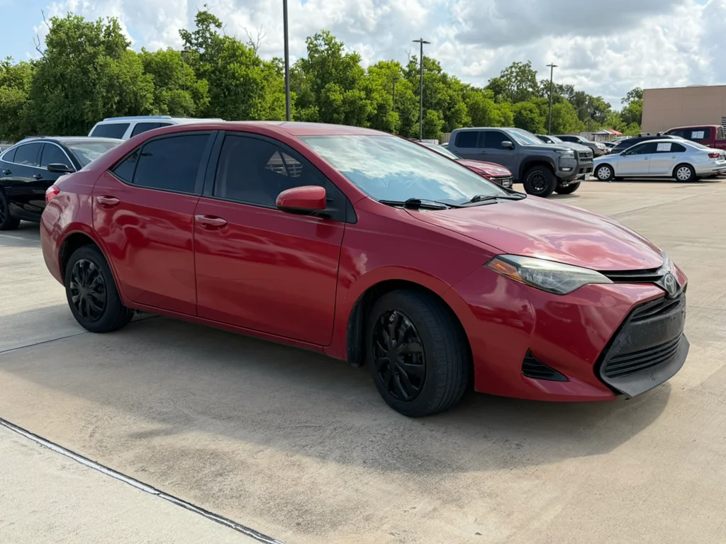Used 2017 Barcelona Red Metallic Toyota LE image 8
