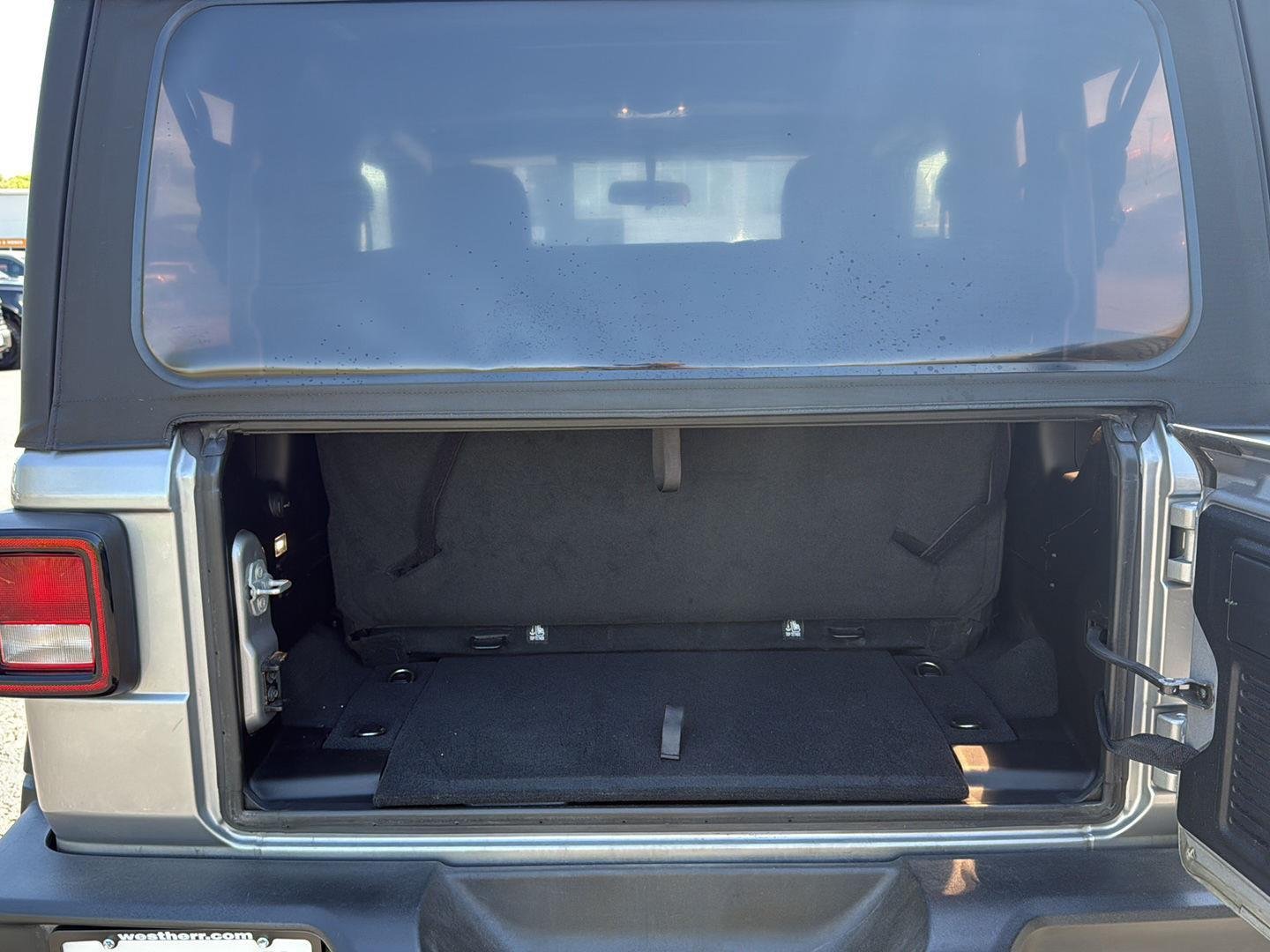 Used 2019 Billet Silver Metallic Clearcoat Jeep Sport image 17