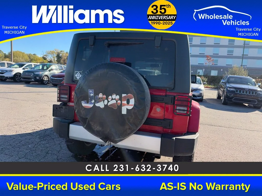Used 2013 Flame Red Jeep Unlimited Sahara image 6