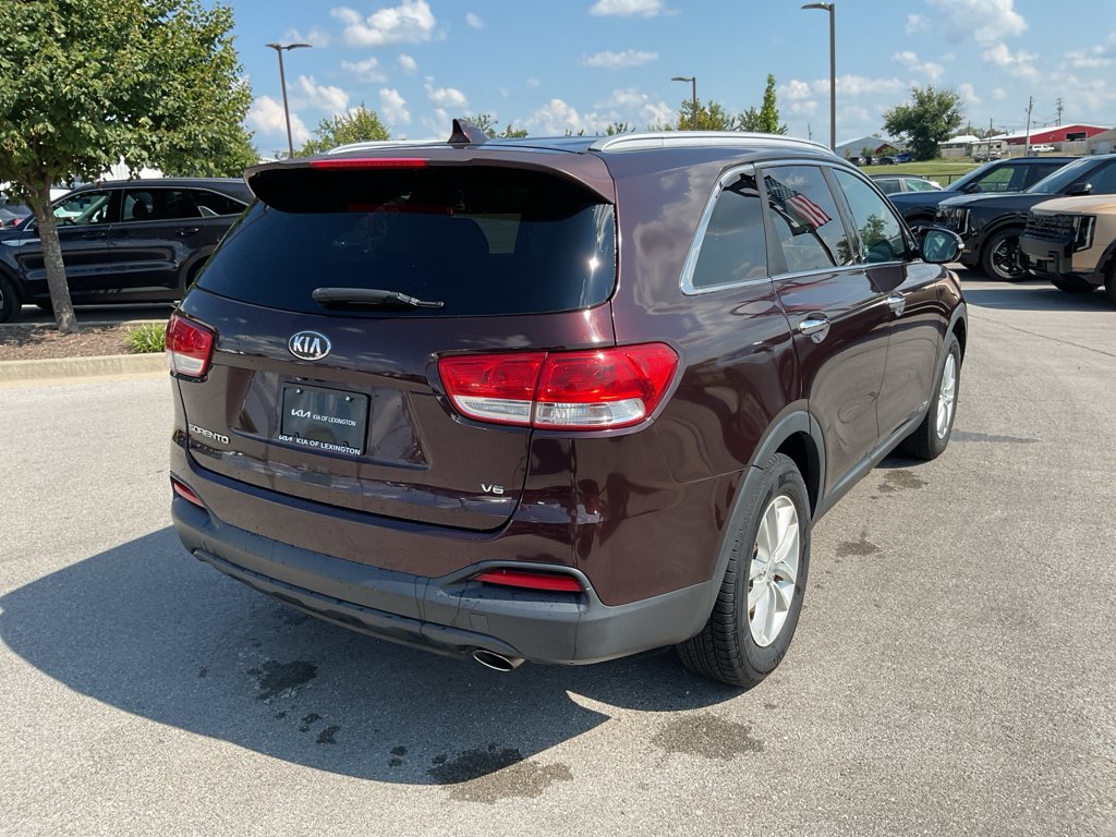 Used 2016 Dark Cherry Kia LX image 9