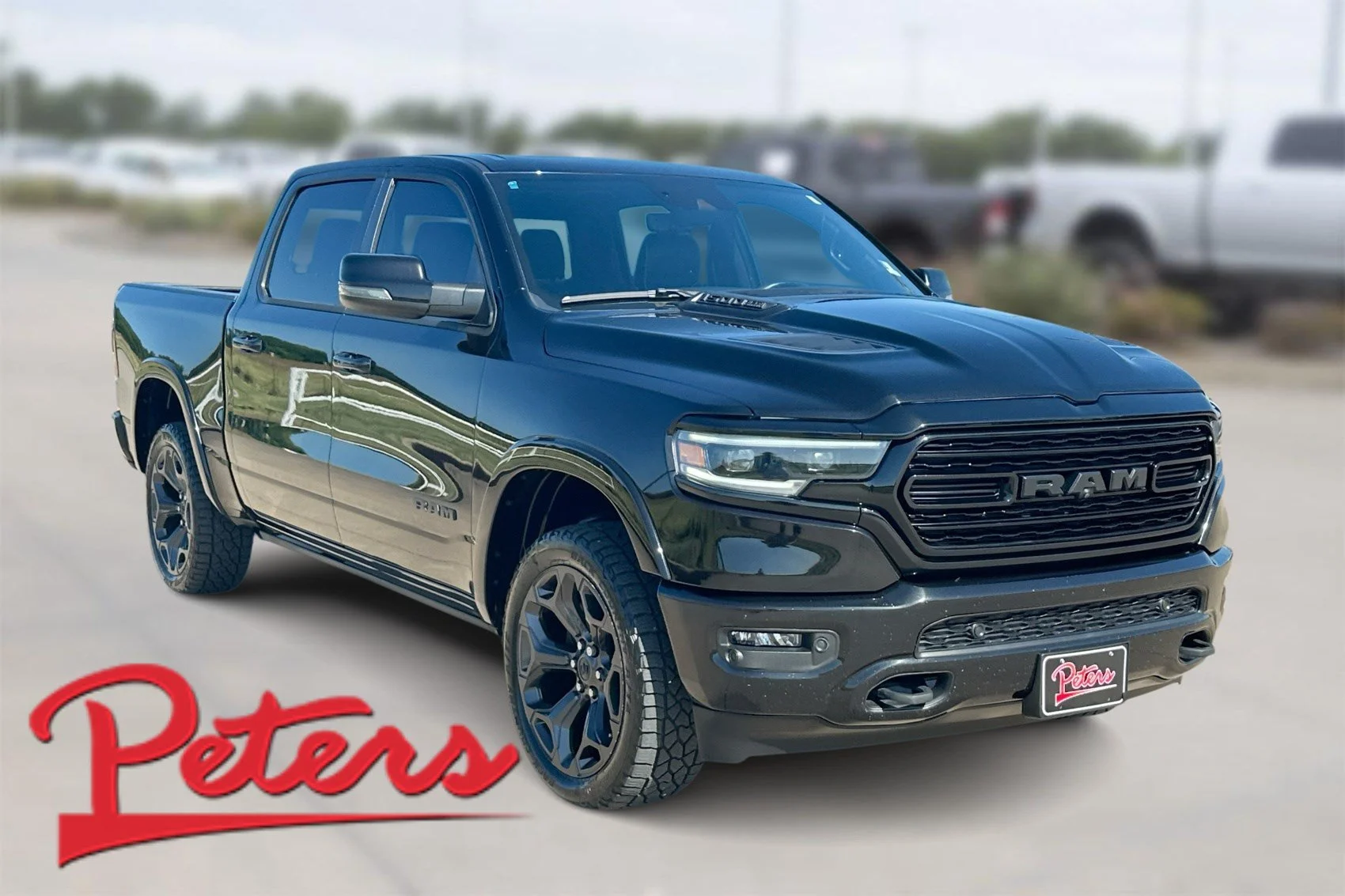 Used 2023 Diamond Black Crystal Pearlcoat Ram Limited image 1