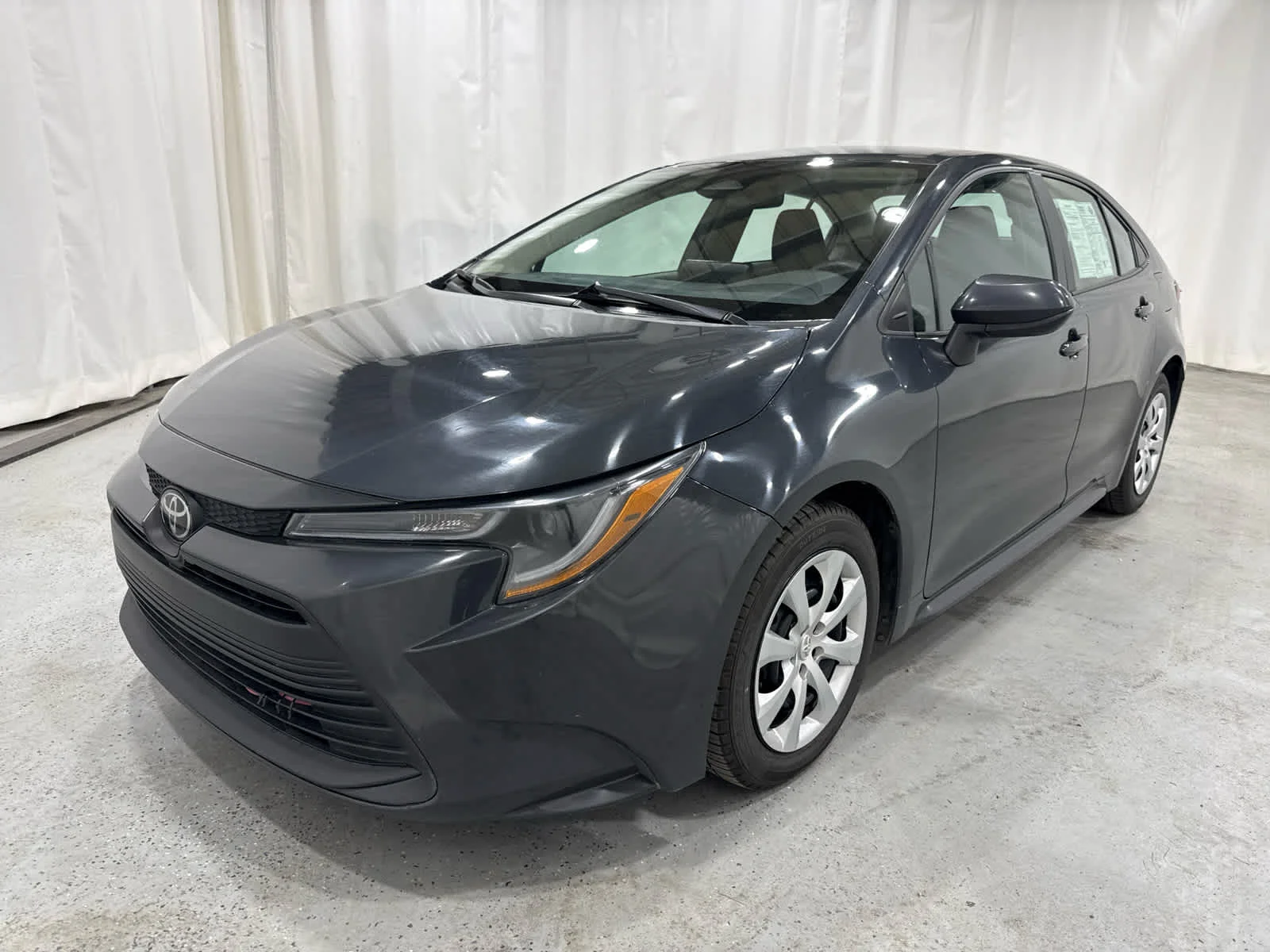 Used 2023 Gray Toyota LE image 1