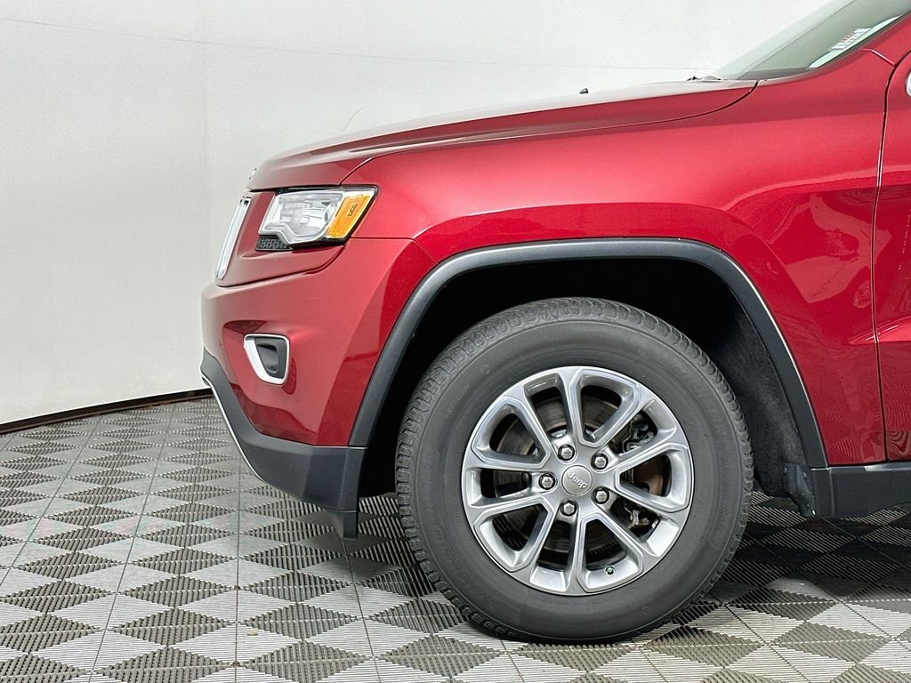 Used 2015 Deep Cherry Red Crystal Jeep Limited image 9