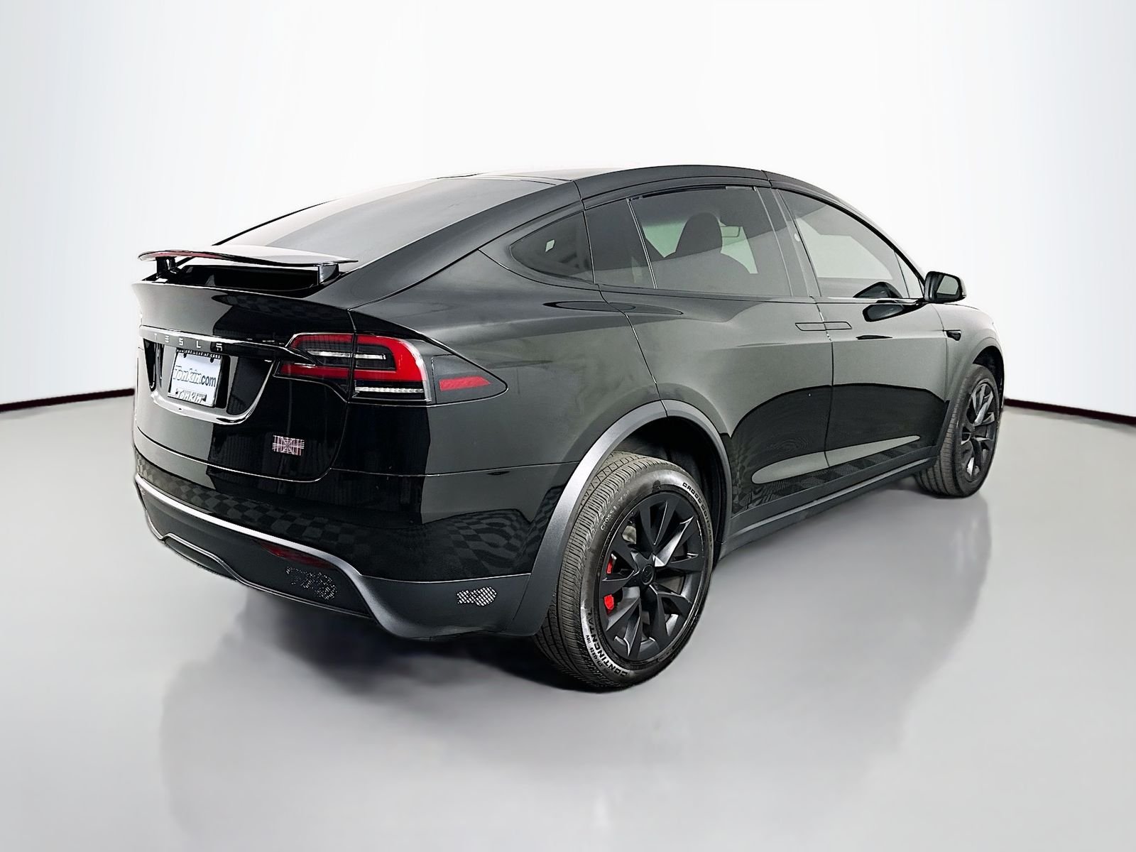 Used 2023 Solid Black Tesla Plaid image 7