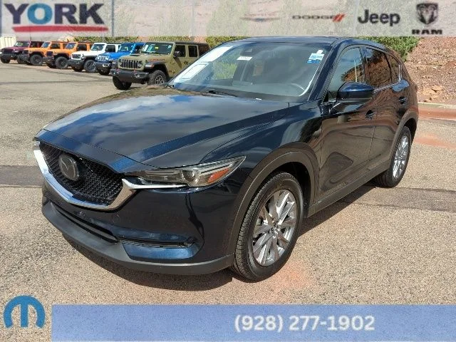 Used 2019 Blue Mazda Grand Touring image 1