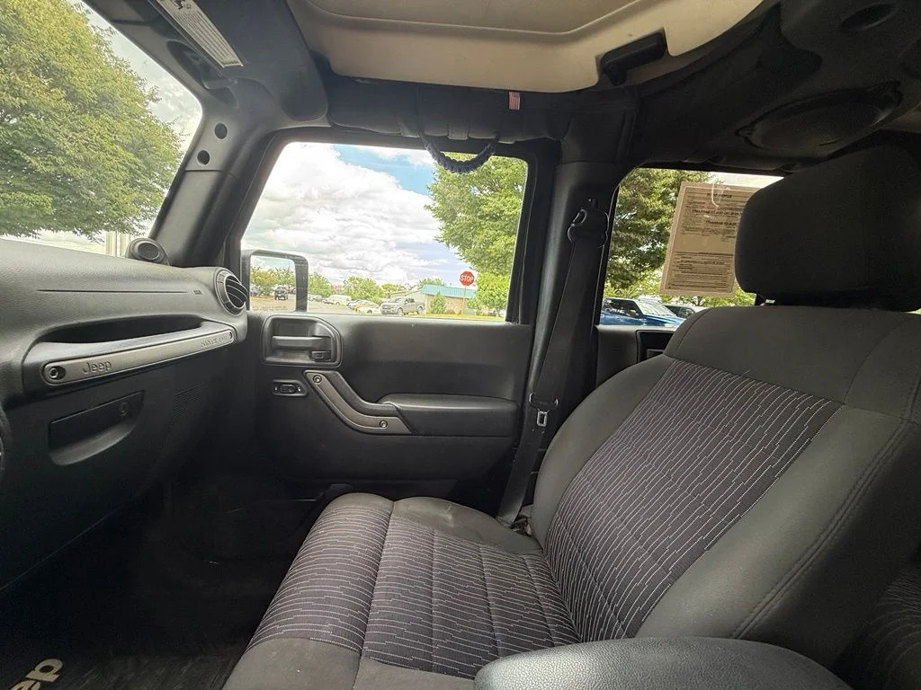 Used 2011 Black Jeep Unlimited Sport image 10