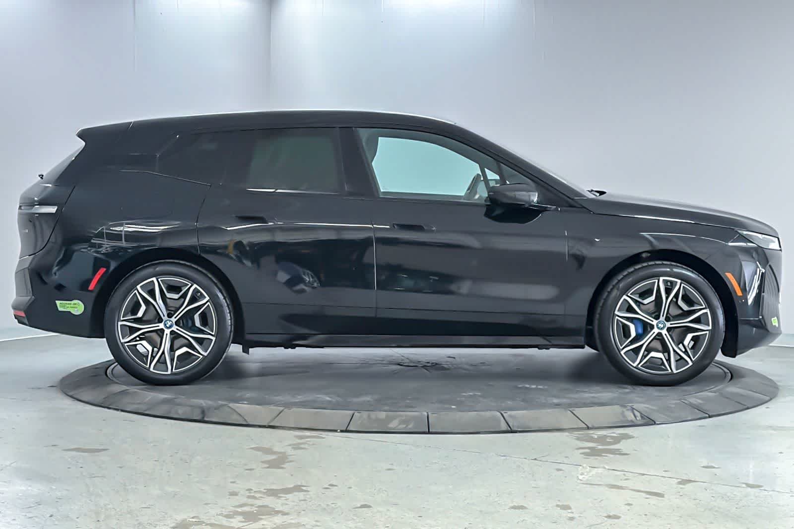 Used 2024 Black Sapphire Metallic BMW xDrive50 image 8