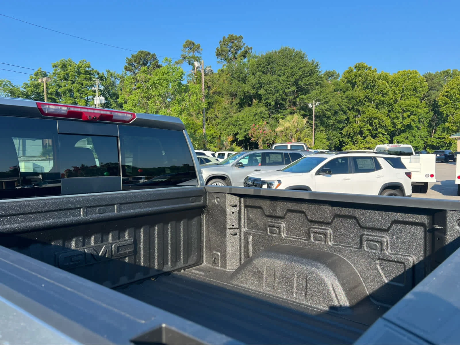 New 2026 Sterling Metallic GMC AT4 image 6