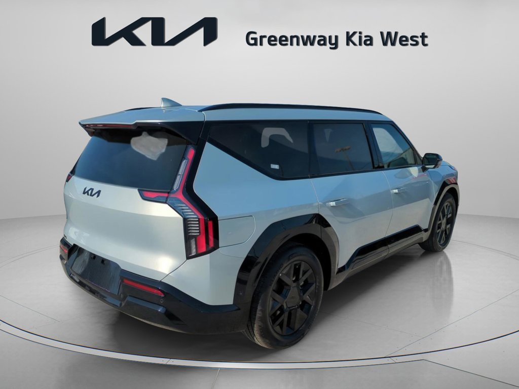 New 2026 Ivory Silver Kia Land AWD image 8