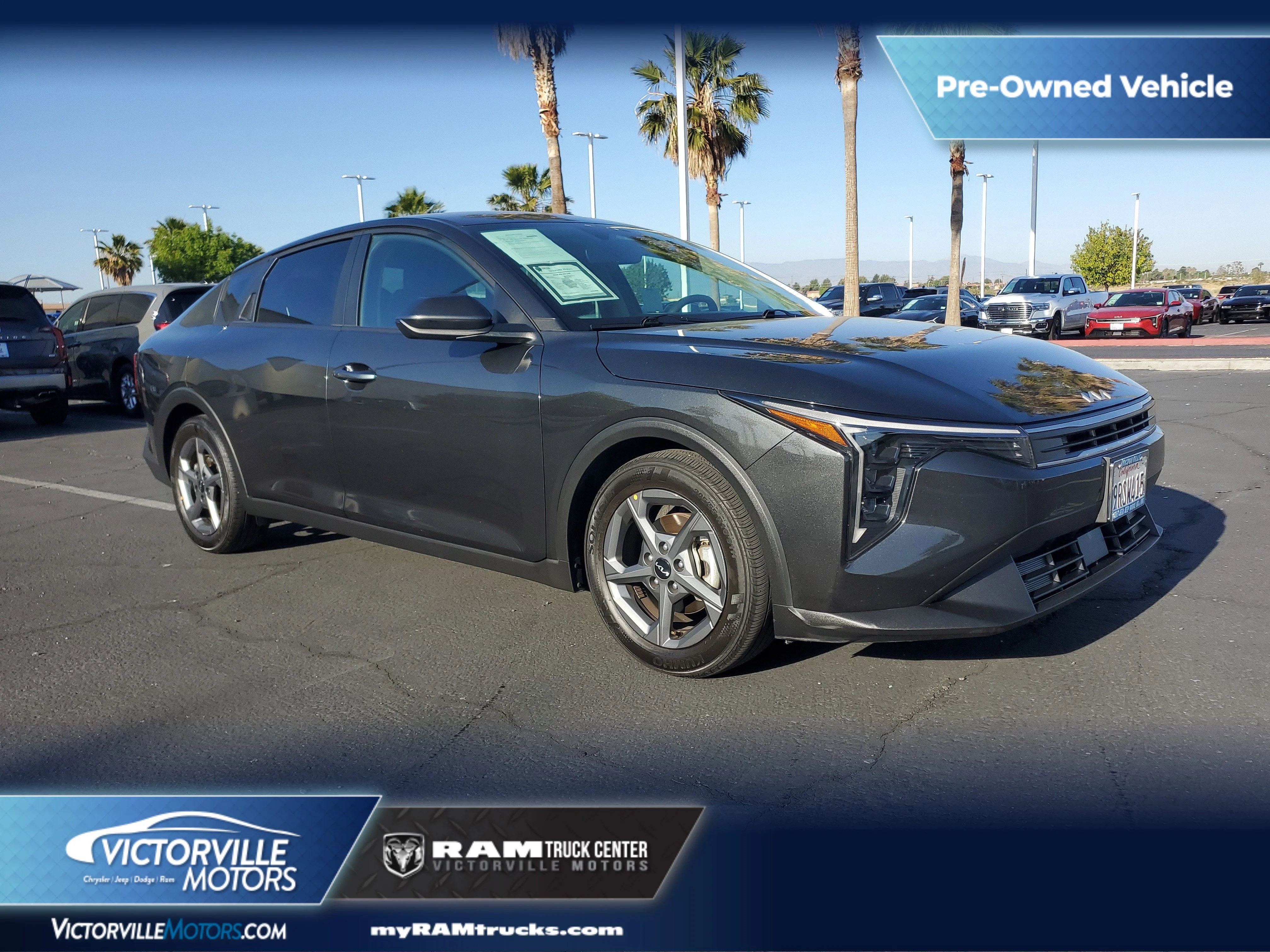 Gray 2025 Kia K4 LXS FWD Sedan Front-Wheel Drive Continuously Variable Transmission