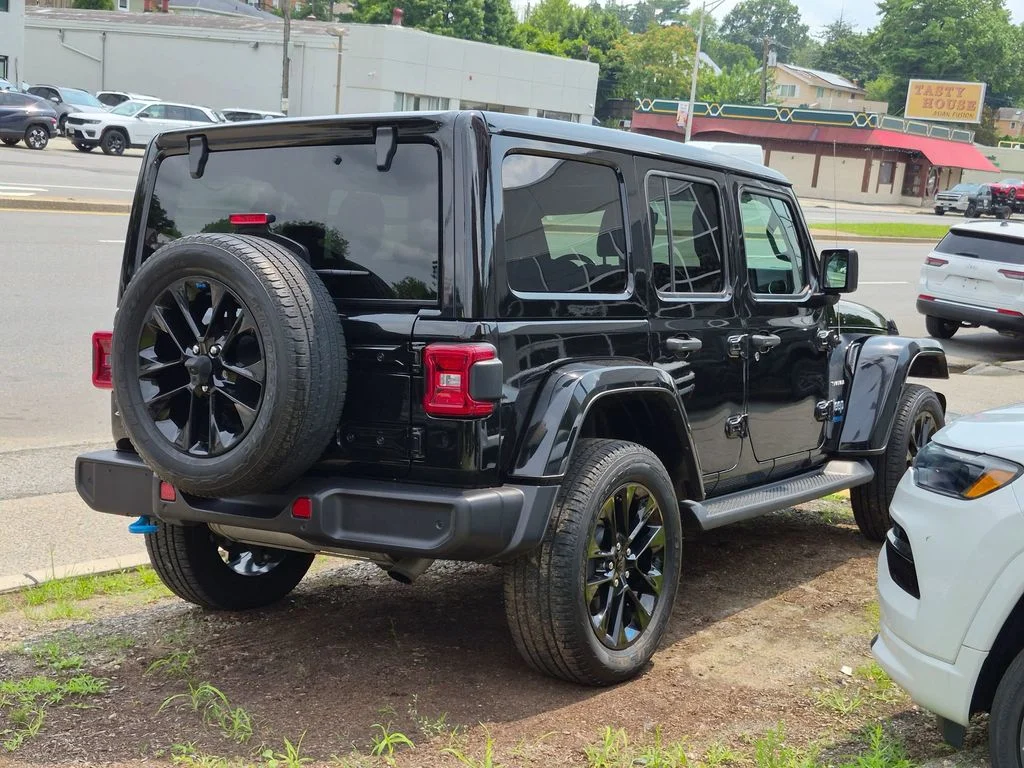 Used 2022 Black Jeep Unlimited Sahara 4xe image 5