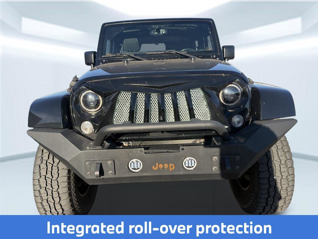 Used 2015 Black Clearcoat Jeep Sahara image 2