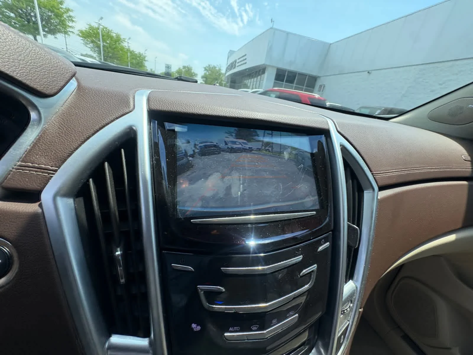 Used 2015 Silver Coast Metallic Cadillac Luxury Collection image 24