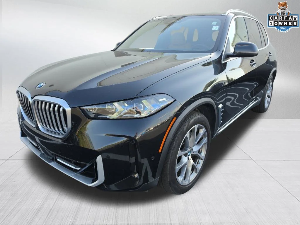 Used 2024 Black Sapphire Metallic BMW xDrive40i image 1