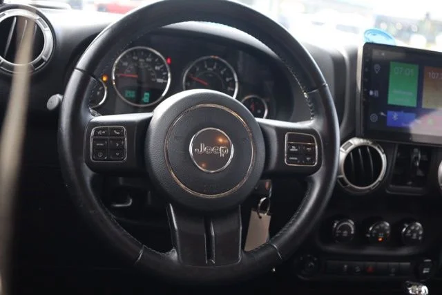Used 2017 Black Jeep Unlimited Sahara image 8