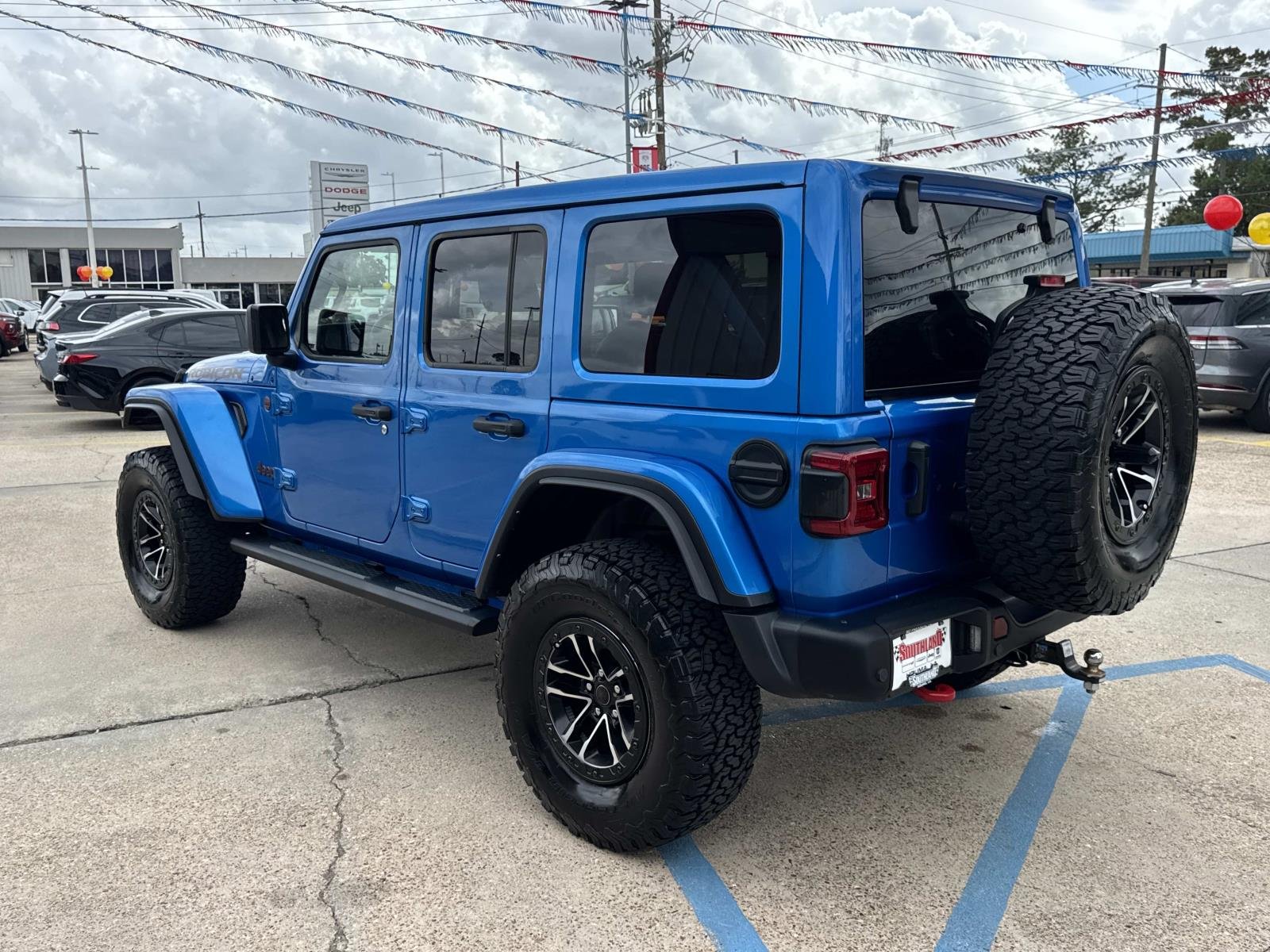 Used 2024 Hydro Blue Pearlcoat Jeep Rubicon X image 5